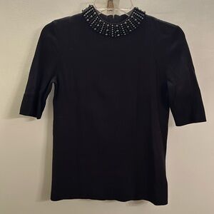 Black sweater with beaded neck